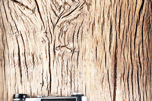 Old rangefinder camera on the old wooden table., a Background Photo by Volff