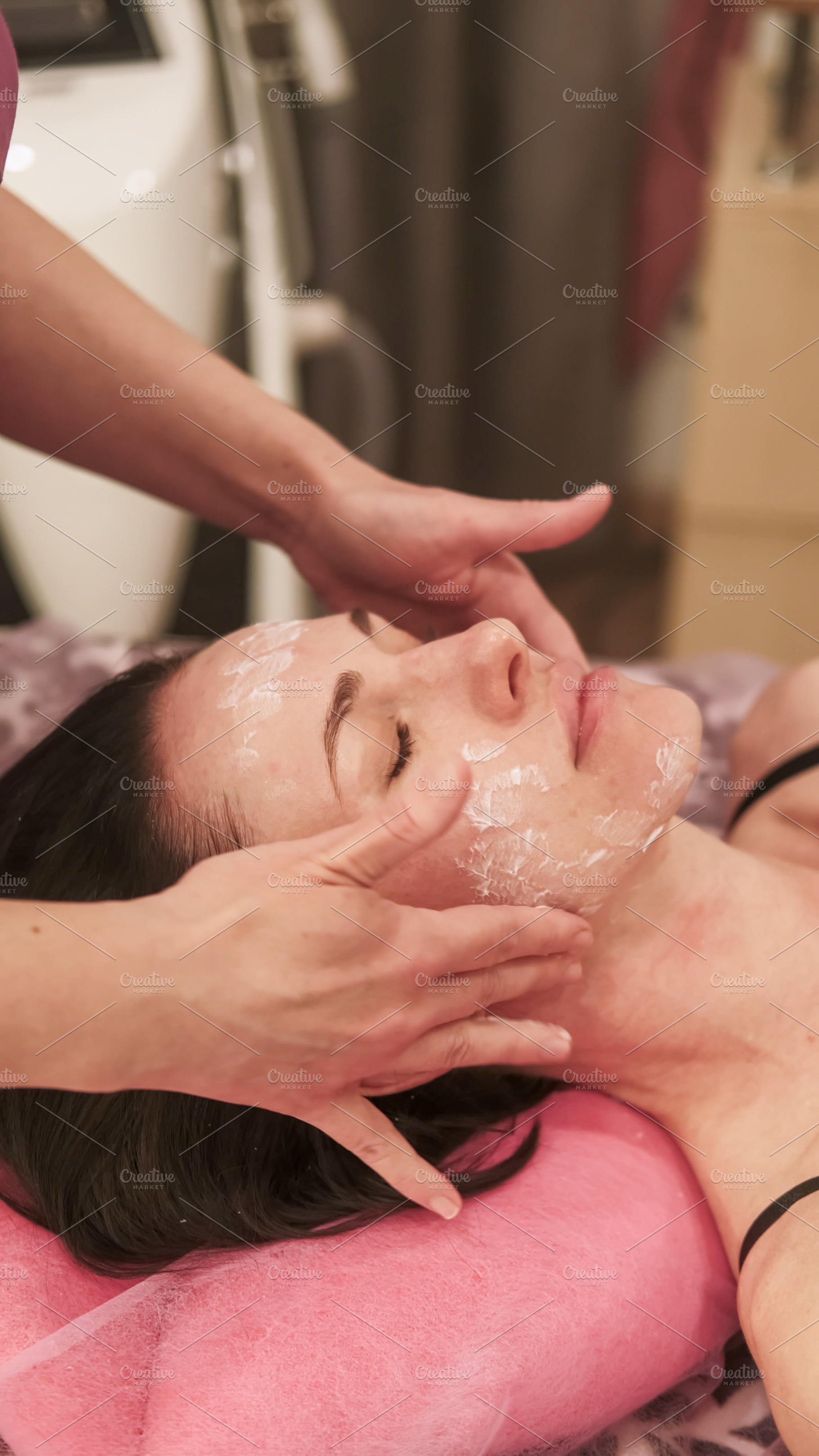 Beauty care facial treatment hand cream woman face, a Person Photo by Photo Drive Studio