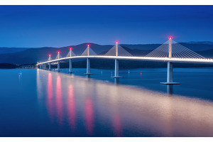 Modern Peljesac bridge with lights, an Architecture Photo by den-belitsky