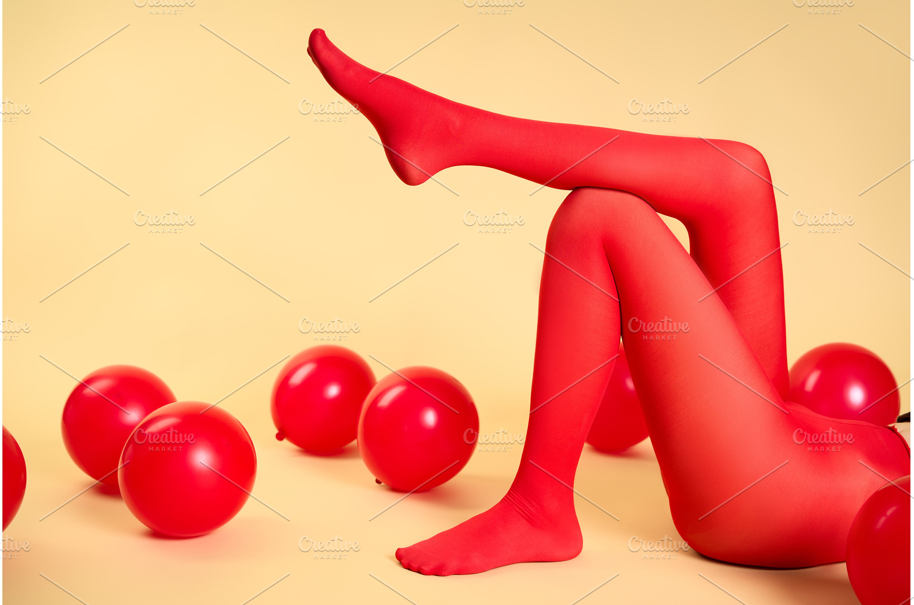 Long slim woman legs in red tights, a Beauty & Fashion Photo by Gladkov photography