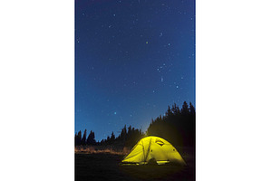 Luminous tourist tent under the