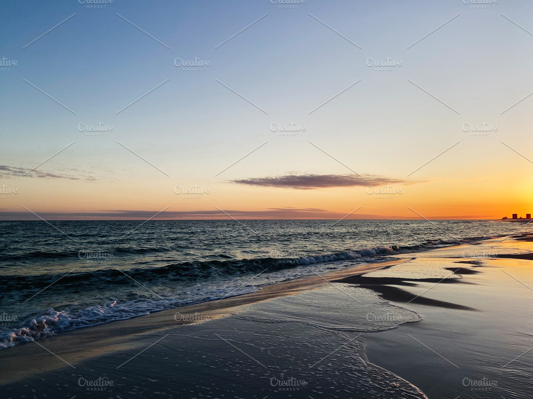 Sunset over a calm Florida Pensacola beach with gentle waves and orange sky alo, a Nature Photo by AS photostudio