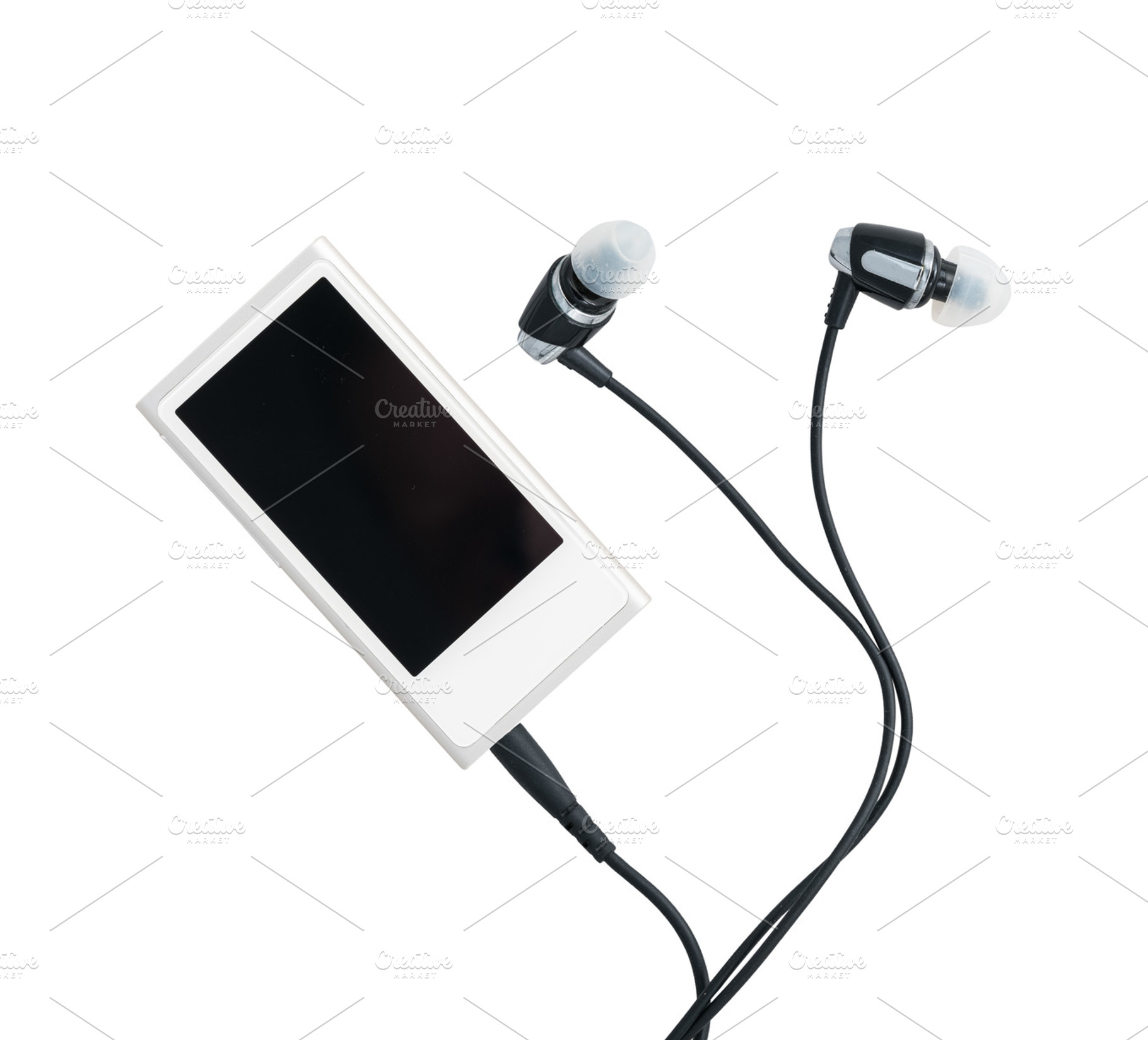 Small mp3 music player and earbuds featuring music, player, and mp3, a Technology Photo by Backyard Stock