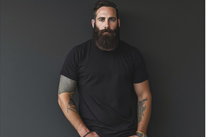 Punctilious Bearded man black shirt, a Person Photo by Ylivdesign