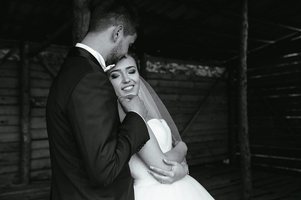 Photo of beautiful couple on nature in wooden hut containing couple, wedding, a Person Photo by Tekso