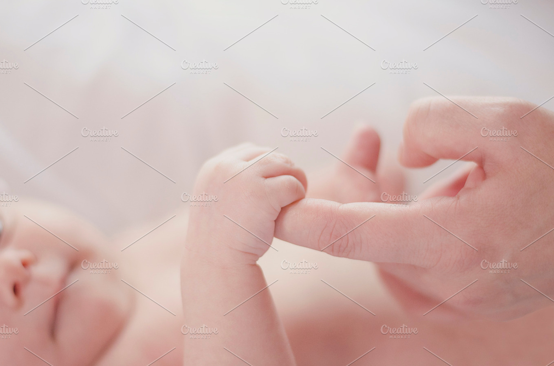Newborn baby and parent, a Person Photo by EnjoyLife