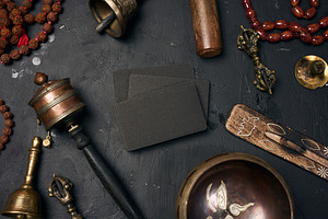 Blank black business cards in the center surrounded by a Tibetan, a Health & Medical Photo by ndanko