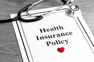 Health insurance policy stethoscope, a Health & Medical Photo by FineArtStudio