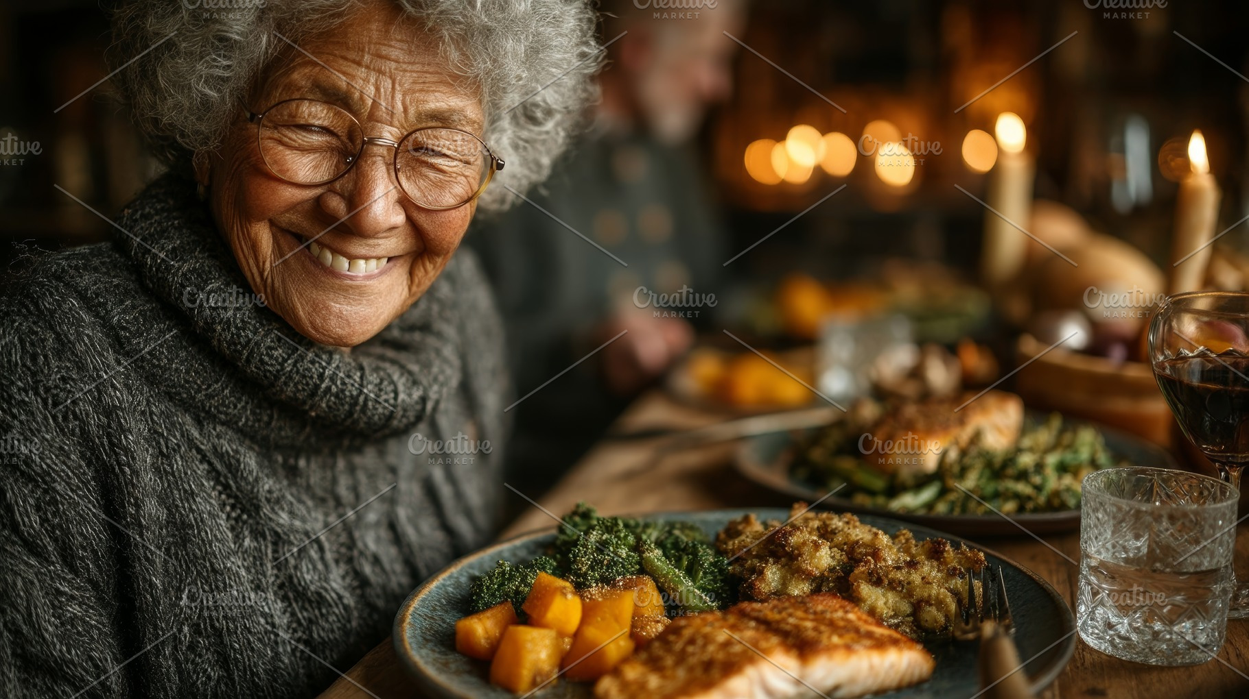 Senior woman smiling at cozy family dinner table with roasted salmon, vegetable, a Photo by AS photostudio