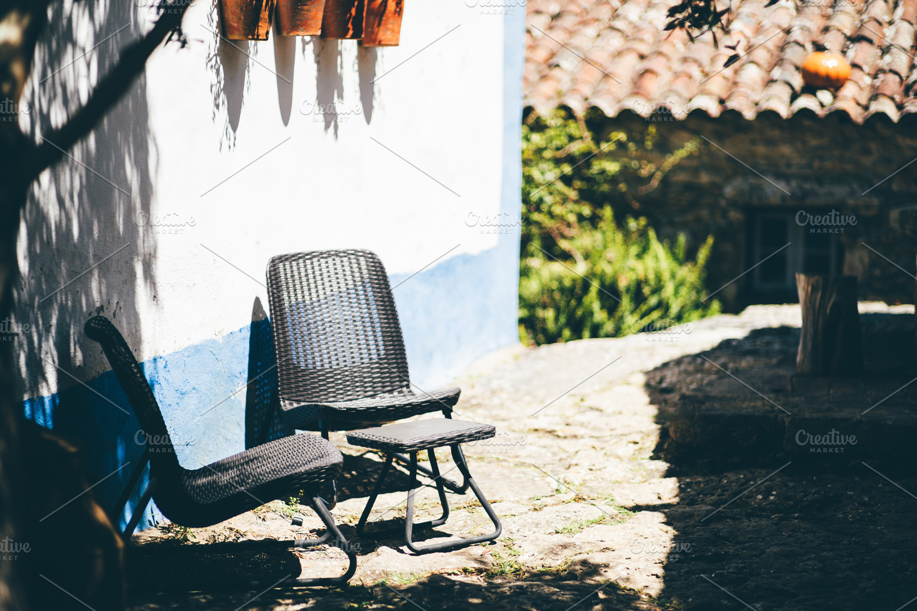 Rustic patio with wicker chairs, an Architecture Photo by SkyNext