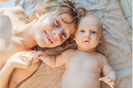 Older and younger baby brothers