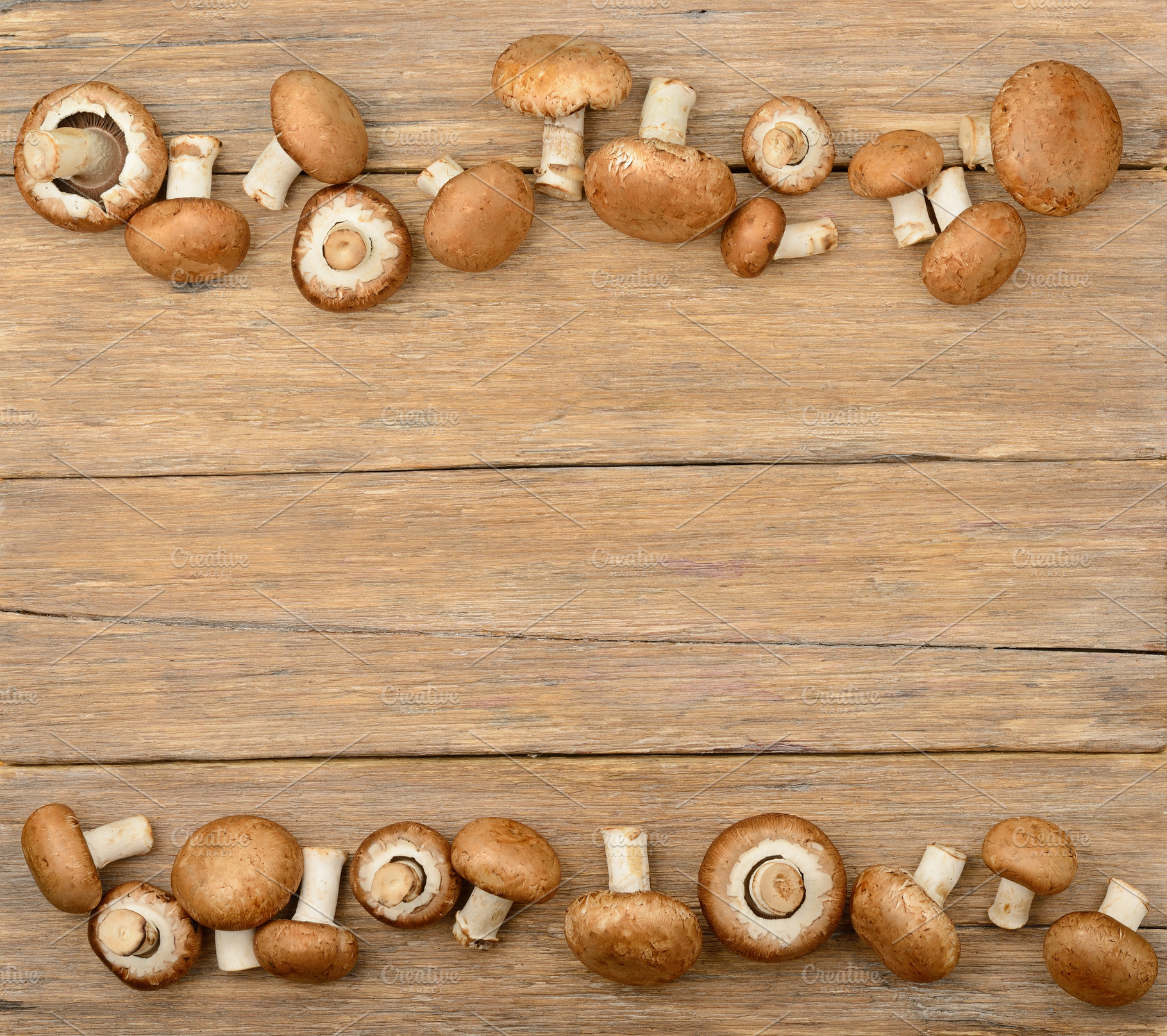 Champignon mushrooms on old wooden table., a Food & Drink Photo by Serg64