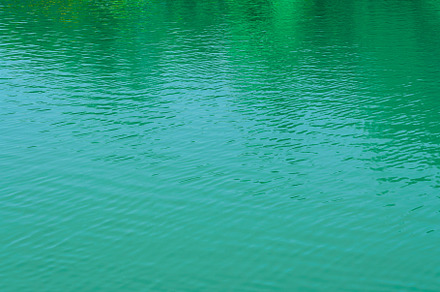 The texture of the waves of turquoise color of fast-flowing wate, a Nature Photo by Eugene_Photo