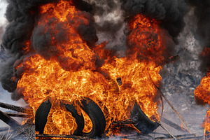 Burning cars tires flame red fire, a Transportation Photo by Alexander-Piragis