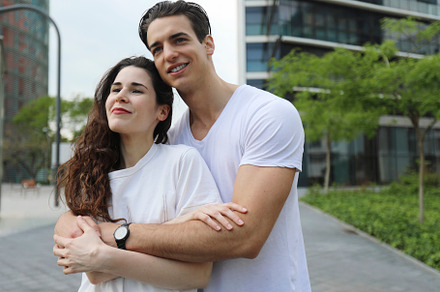 Man and woman couple smiling confident hugging each other at street, a Person Photo by RF Images