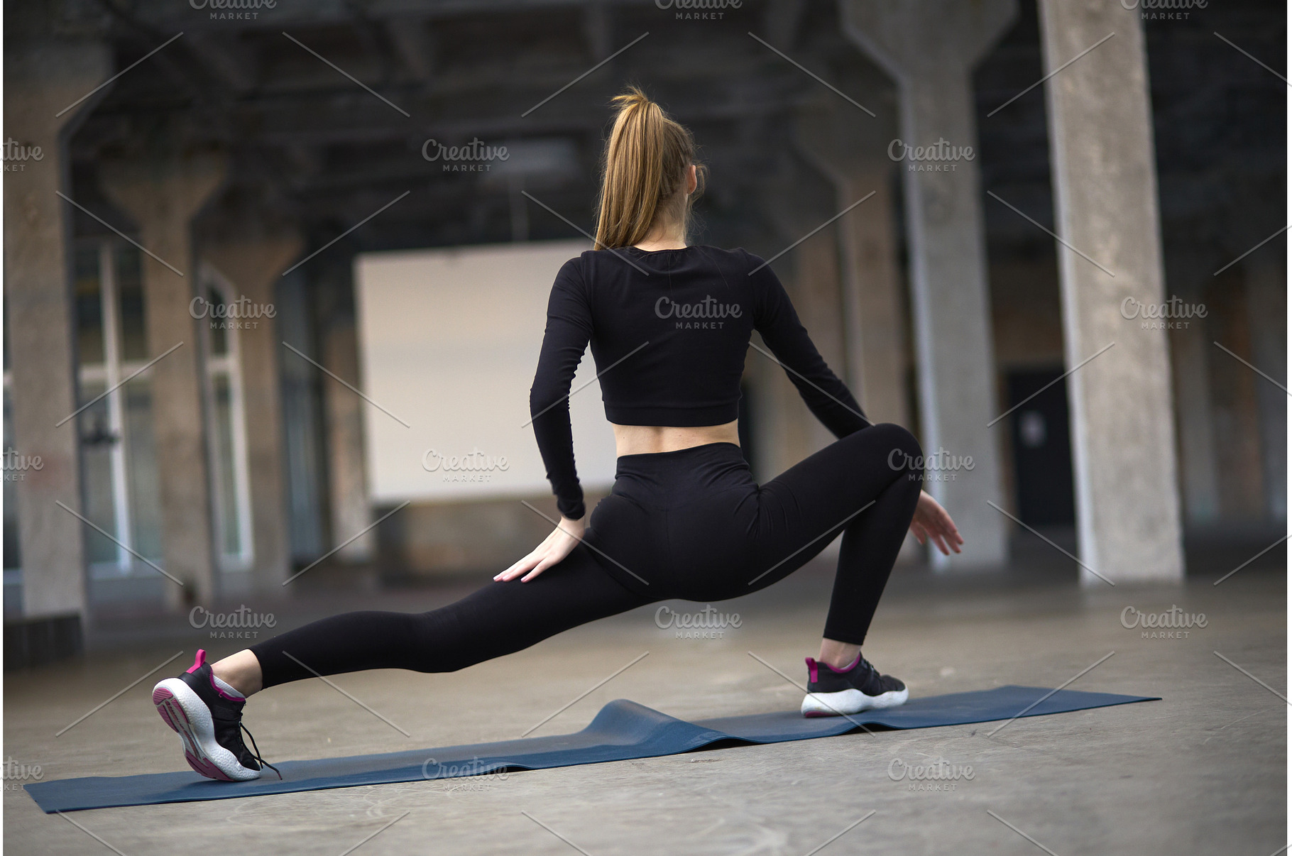 Woman in athletic attire stretching, a Sports & Recreation Photo by wip3out