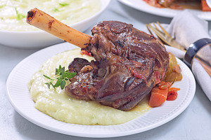Braised lamb shanks with vegetables served with horseradish and fennel mashed p, a Food & Drink Photo by iuliia_n