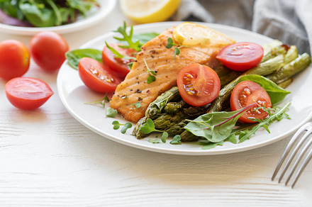Baked Delicious salmon, green asparagus on  plate, a Food & Drink Photo by Olena Rudo