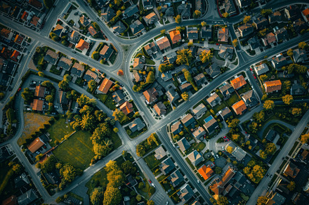 The vibrant suburb showcases winding, a Photo by Tanuart
