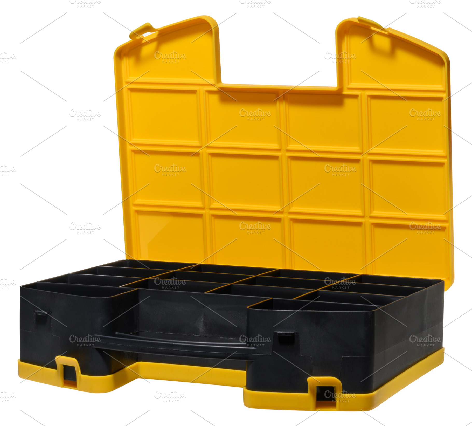 Open yellow black plastic storage organizer with multiple compar, an Industrial Photo by ndanko
