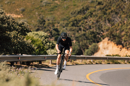 Professional cyclist riding his bike, a Sports & Recreation Photo by Artem Varnitsin