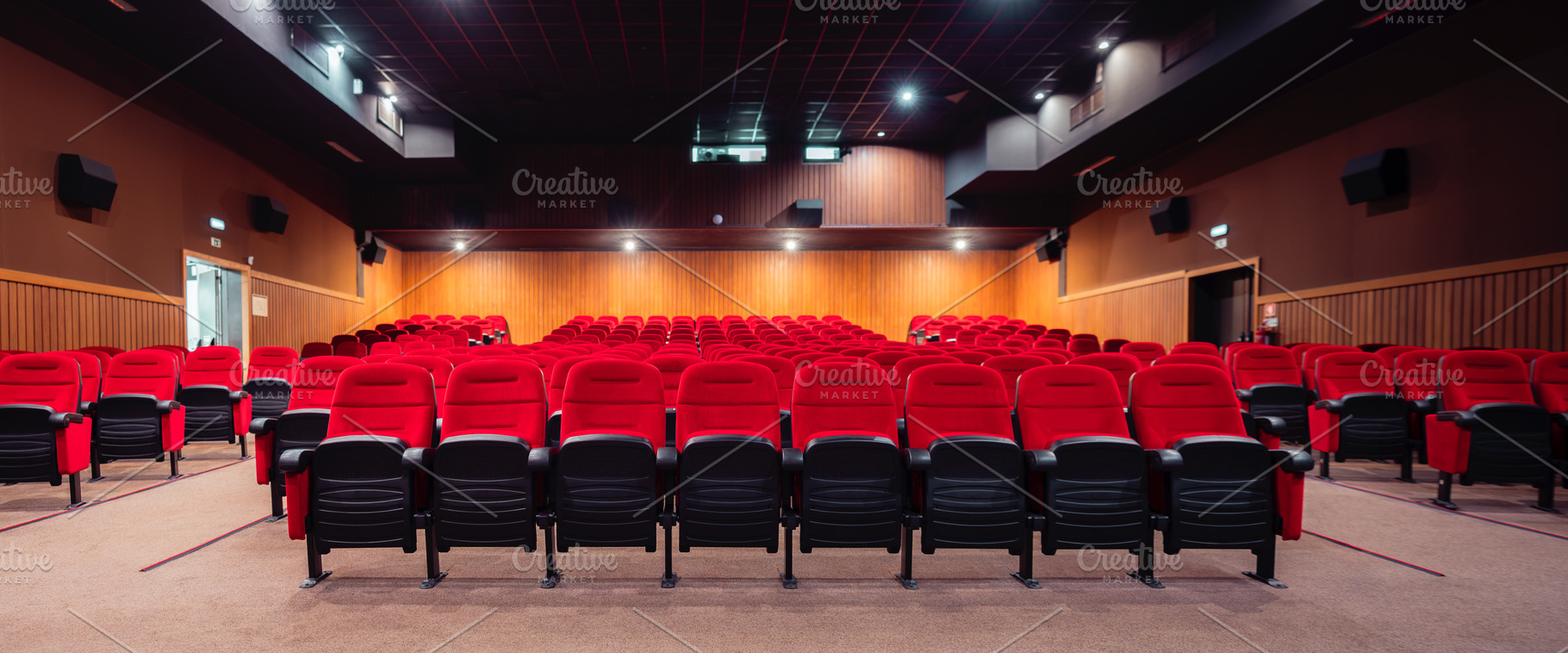 Empty cinema hall with red seats, an Architecture Photo by SkyNext