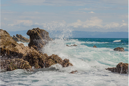 Sea wave high crash at rock stone, a Nature Photo by Herlan Khenz