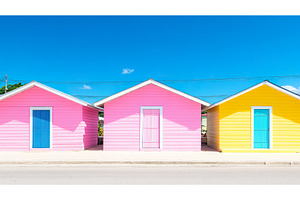 Colorful row of brightly painted, an Architecture Photo by Lermont51