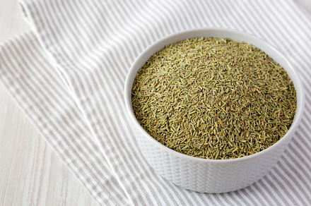 Organic Dried Rosemary in a Bowl, low angle view. Copy space., a Food & Drink Photo by LiudmylaChuhunova