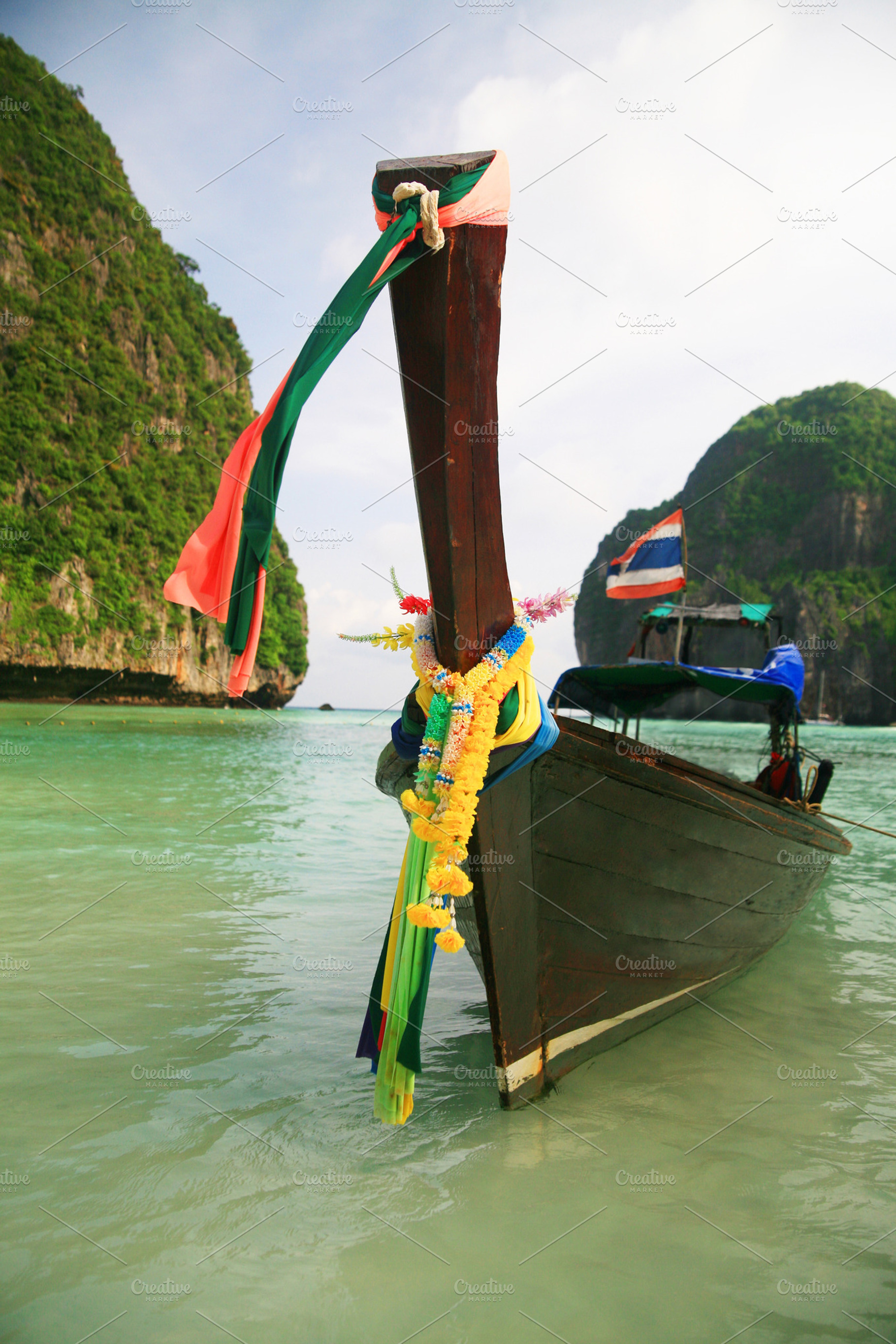 Thailand longtail traditional boat stock photo containing asia and thailand, a Holiday Photo by VIBE Collective