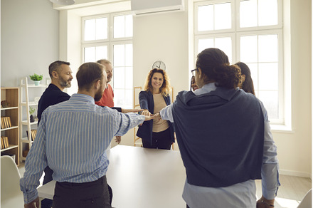 Team of diverse business people, a Person Photo by StudioRomantic