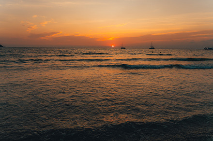 Orange beach at summer dusk on the island, a Nature Photo by Art Rachen