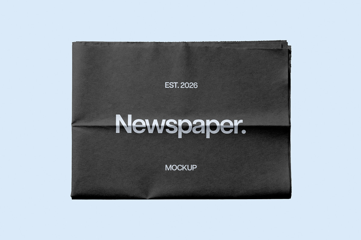 Newspaper Mockup, a Books & Magazine Mockup by Design Squad (Photo 5 of 5)