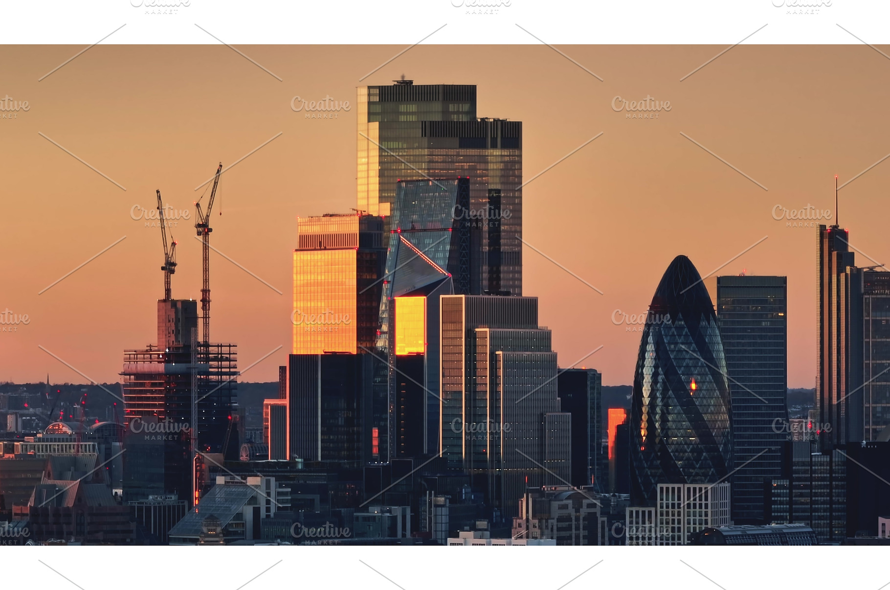 London skyline reflecting golden, an Architecture Photo by Goinyk