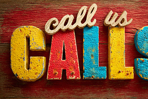 Colorful call us letters on rustic wood background for marketing, advertisement, an Illustration by AS photostudio