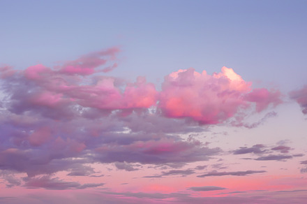 Magic pink sunset sky with clouds