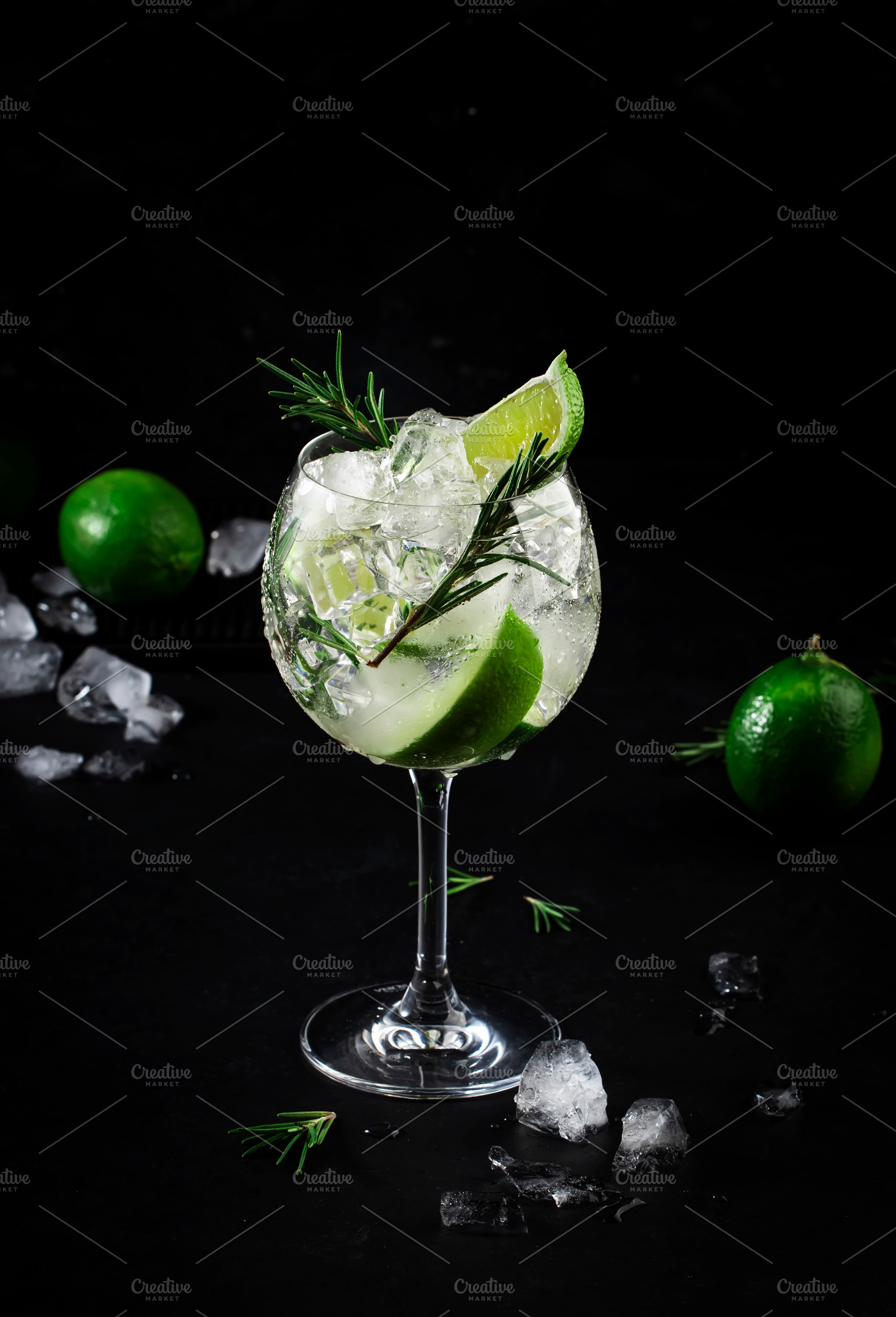 Gin tonic alcoholic cocktail drink with dry gin, rosemary, tonic, a Food & Drink Photo by 5PH