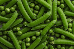 Whole green pea pods and loose peas, a Food & Drink Photo by professorinc