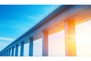 Modern bridge construction at sunset, an Industrial Photo by Lermont51