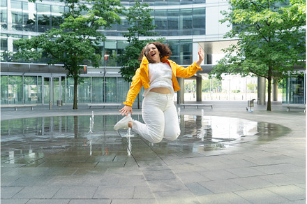 Happy curvy woman in city, a Nature Photo by Neirfy