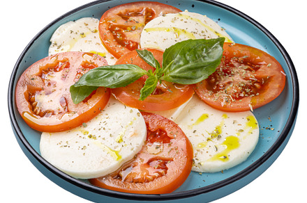 Caprese salad with mozzarella, tomatoes, a Photo by Grafvision photography