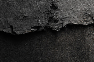 Surface of black stone with cracks, a Photo by Beautiful things