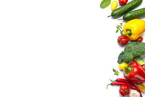 Fresh healthy vegetables creating a vibrant frame on white backg, a Photo by Olena Rudo