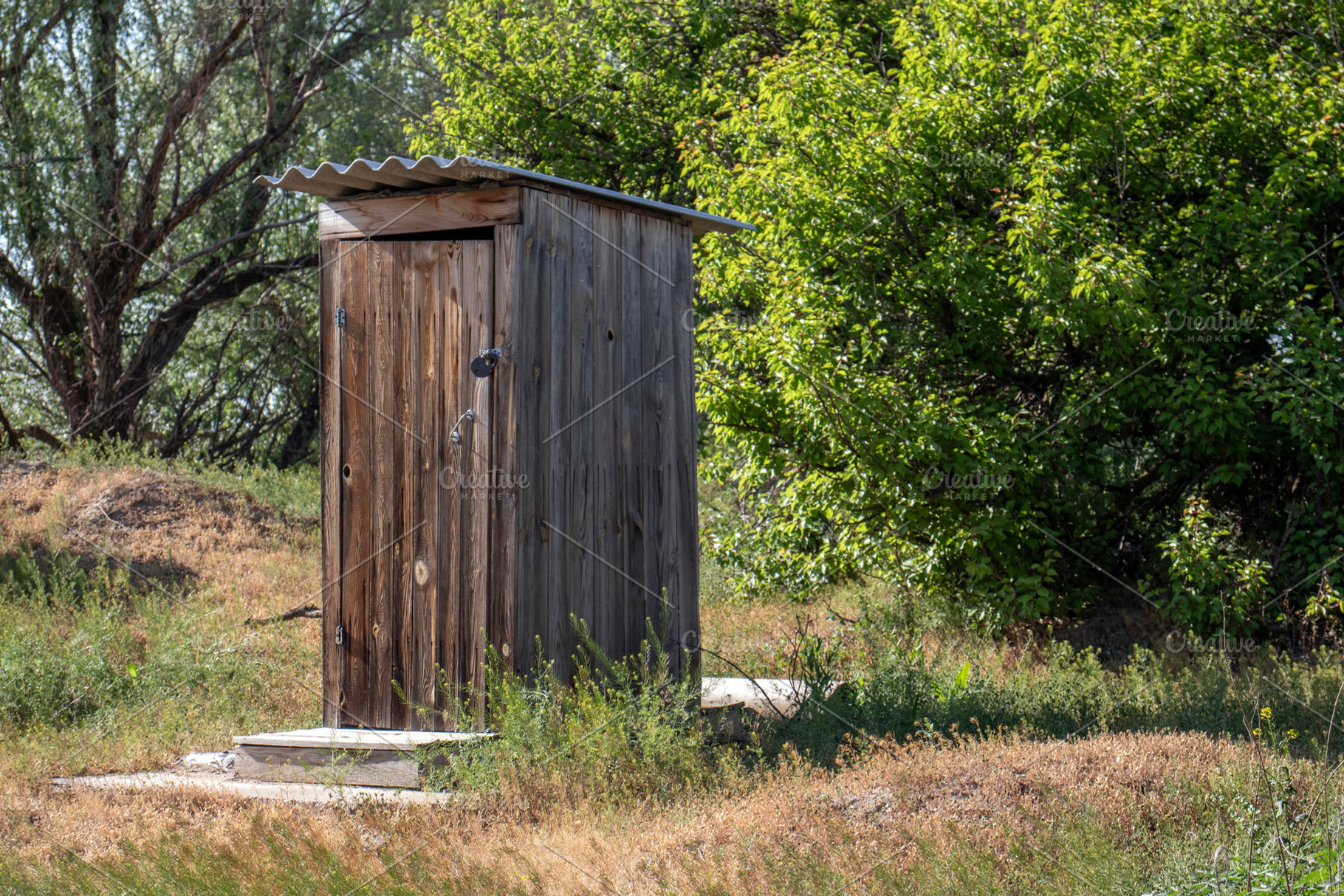 Rustic wooden outdoor toilet, a Technology Photo by Schreibikus