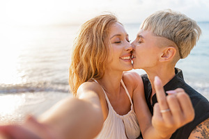 Kiss containing finger gesture, rights, and women