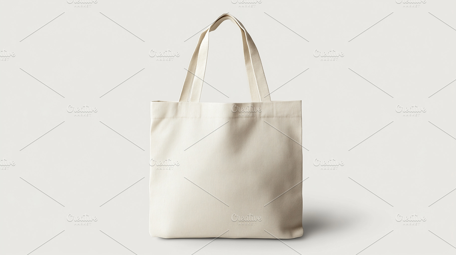 Plain beige canvas tote bag against, a Background Photo by MistyDay