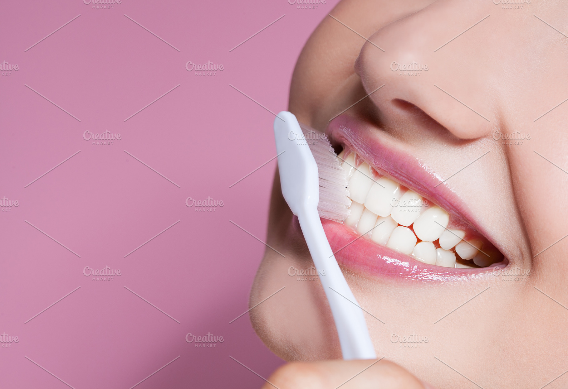Young woman smiling with toothbrush containing adult, attractive, and, a Person Photo by telnyaw