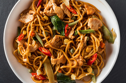Wok stirfry egg noodles with fried containing asian, background, and beans