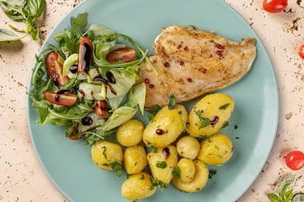 Grilled chicken breast with roasted potatoes