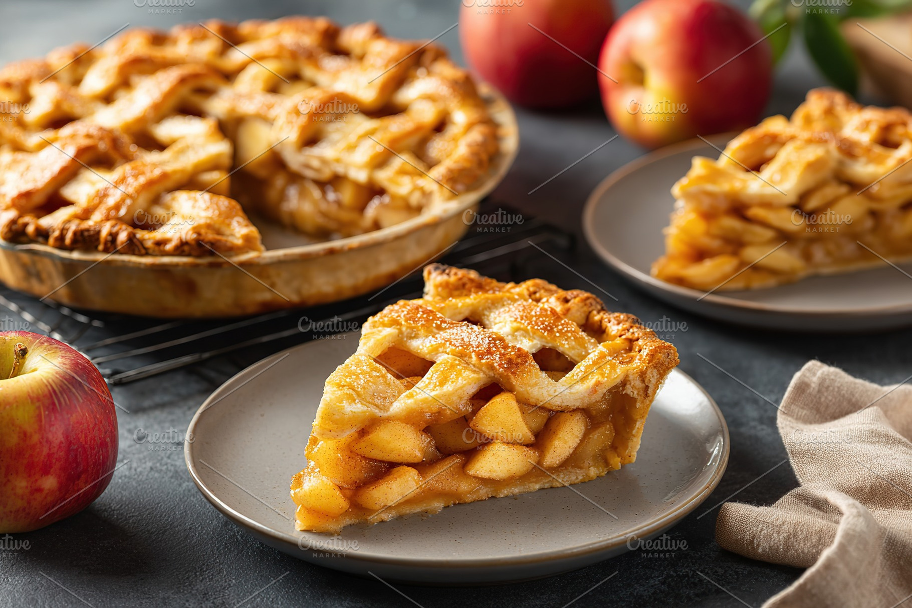 Golden lattice apple pie served with fresh apples on a rustic table, a Food & Drink Photo by AlyaAnd